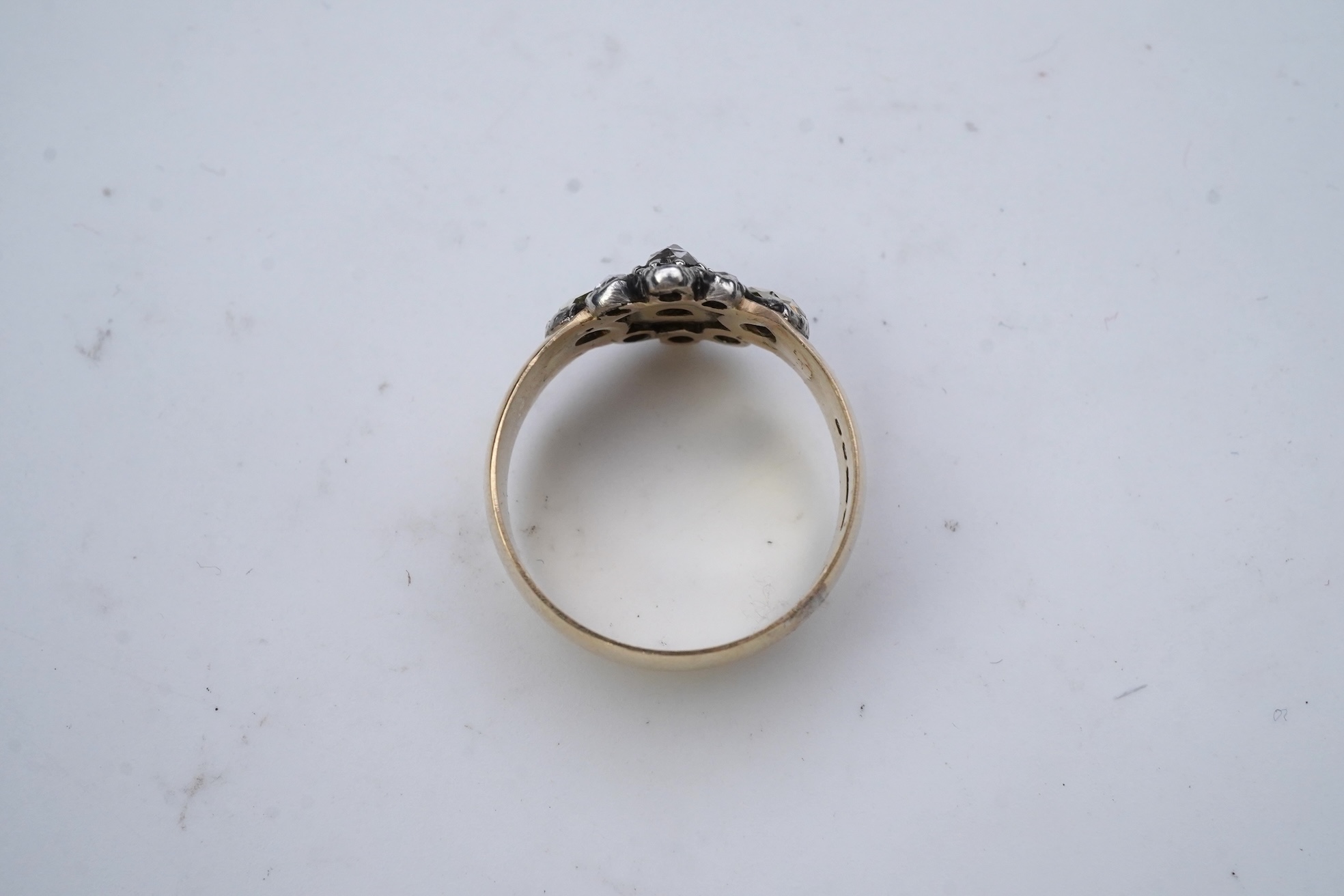 A gold and diamond ring